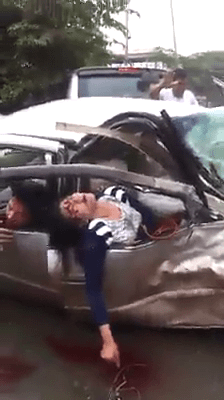 Dead Trapped and Injured in Car Crash