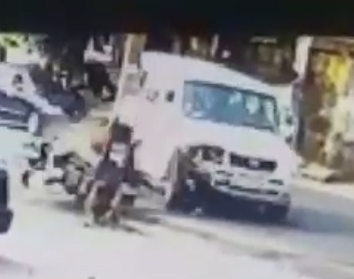 Motorcyclist Smashes into Police Van Head on