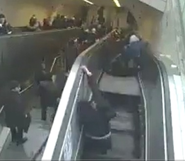 Man Gets Sucked inside an Escalator