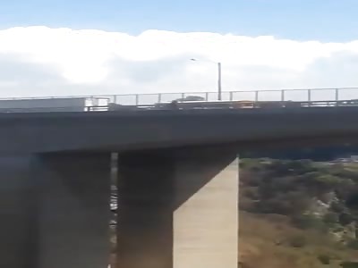 Depressed Young Woman Throws Herself off Tall Bridge