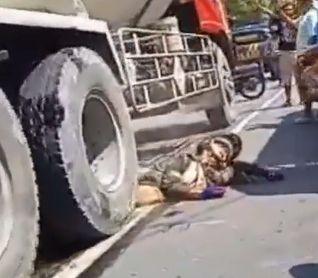 Biker Completely Crushed Under Truck Wheel... They Remove it at The End of the Video (Full Version)