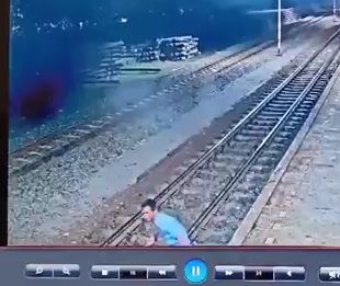 Suicidal Man Jumps in Front of Train
