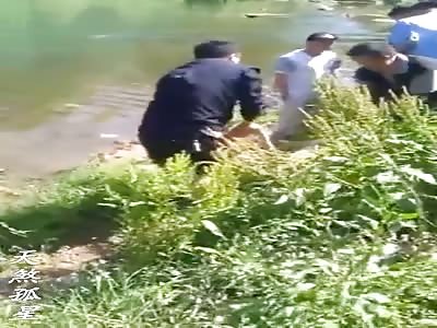 Two Chinese Kids Drowned in a River
