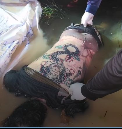 Corpse With a Dragon Tattoo Found Floating in Swamp in Chonburi Thailand