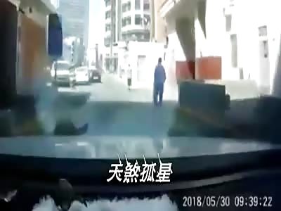 Chinese Woman Gets Crushed by a Minivan