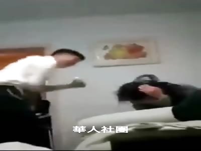 Chinese Man Beats Woman With a Belt Until She Cries