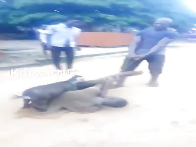 African Thief Dragged in Dirt With a Goat and Kicked in the Face