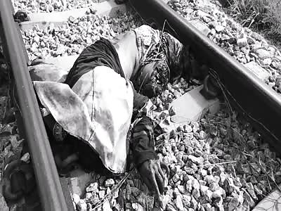 Another Death In Pieces on The Train Tracks