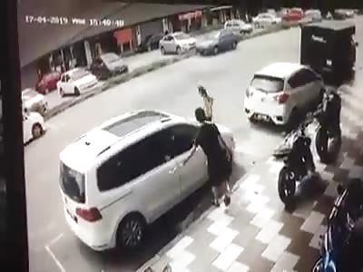 Man Brutally Hacked in the Street