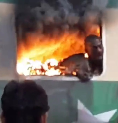 Close-Up of Guy Burned to a Crisp in Train Fire Yesterday