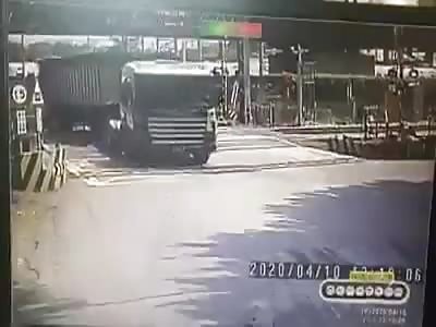 Truck hit by train