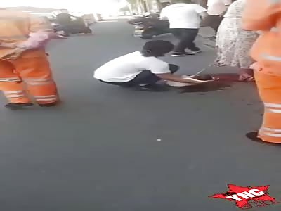 Woman gives birth in the street