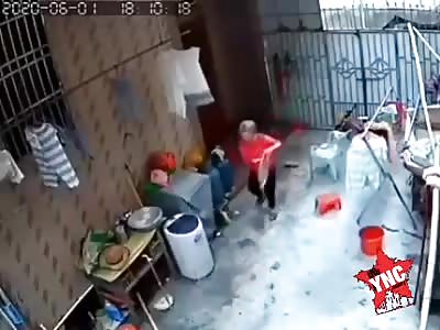 WTF, spoiled boy beats his mother with stick