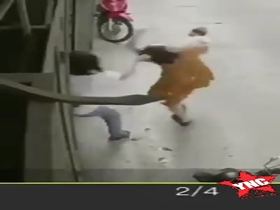 woman pulls on the floor with baby in her arms