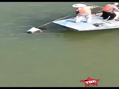 corpse floating in water, suicidal man