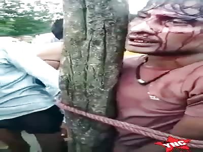 punishment for thief, he was tied up and beaten