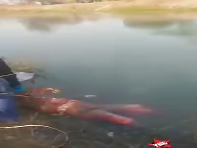 Bloated woman's corpse found in canal.