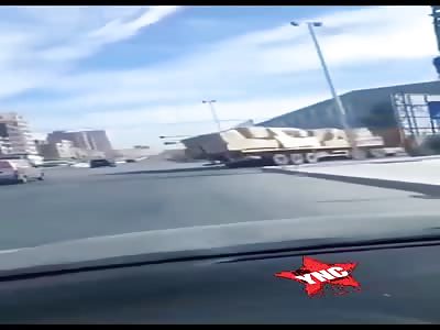 Badly loaded truck sheds it's load.