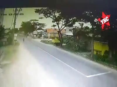 Motorcycle smashes into reversing truck.