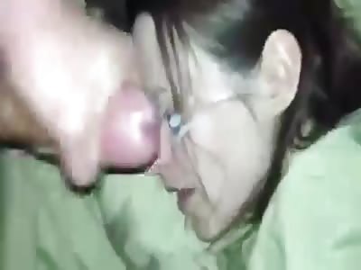 They fill her face with cum while she sleeps