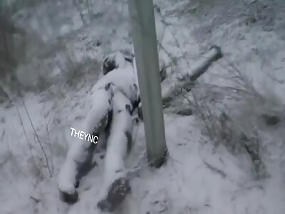 Dead Ukrainian soldier in the snow