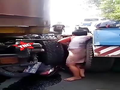 Boy dies stuck in truck wheels
