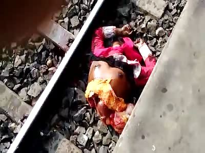 Topless Girl Cut In Half By A Train.