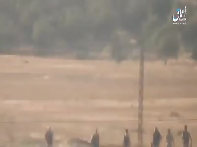 Video shows clashes between ISIS and pro-Assad forces east of Salamiyah.