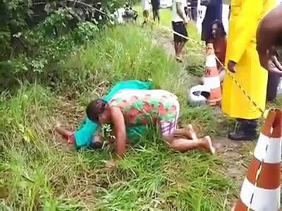 woman mourns the death of her husband! she cries in dismay beside the corpse