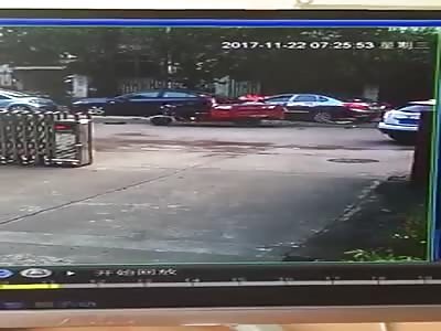 The girl is caught between the two cars