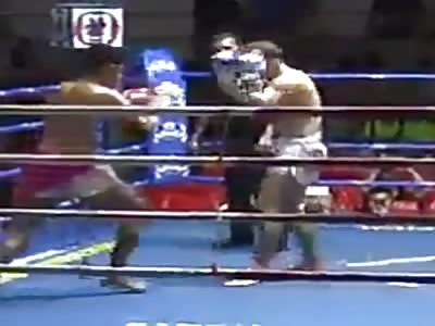 Boxer receives a blow with the elbow that sinks his forehead
