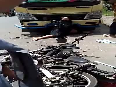 Brutal accident, the man is pressed in the truck