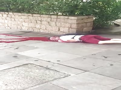 Man killed on the sidewalk bleeding himself