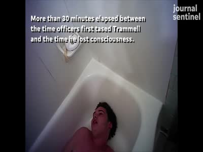 Police officers taser man in the shower