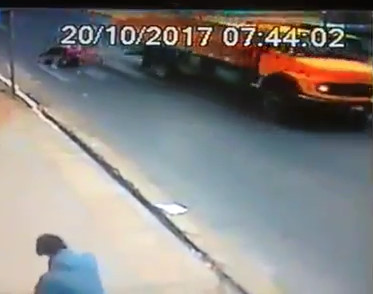 CCTV: Truck Crushes and kills motorcyclist 