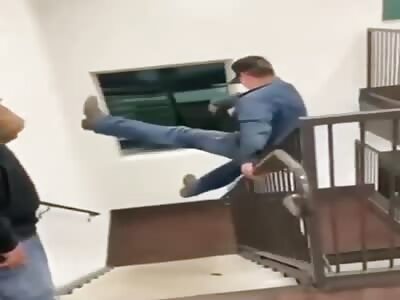 Man Falls Off Stairway Banister 