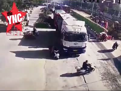 MOTORCYCLE GETS CRUSHED BY A TRUCK