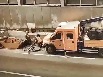 Road Workers Hit by Truck after Another Truck Crashes Into It