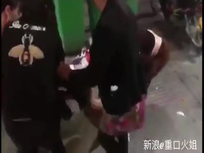 Chinese shoplifter stripped naked
