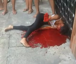 Pretty Girl Shot in the Head Still Agonizing on the Sidewalk