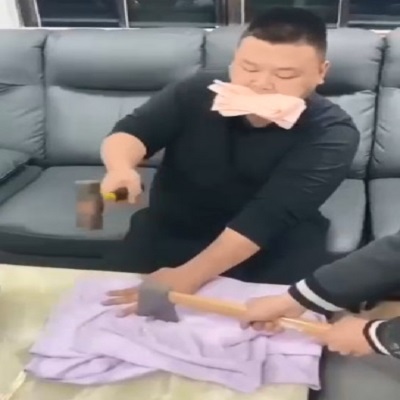 Moron Gets Finger Chopped Off With An Axe