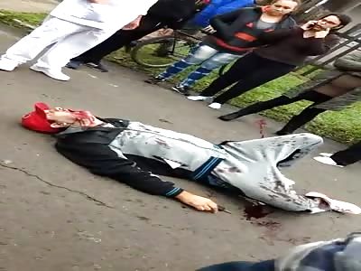 Man killed lays on the ground 