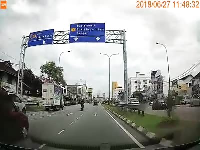 Stupid asshole biker causes accident 