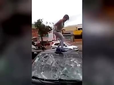 Crazy bitch destroys car 
