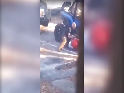 Detective beating black man during arrest