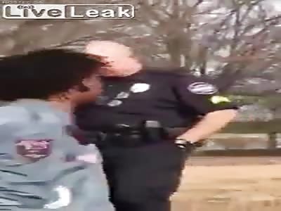 Police officer punching man in face during 