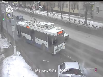 Russia - Car crashes head-on into a bus