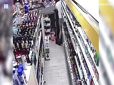 Violent robber storms shop and attacks terrified couple inside
