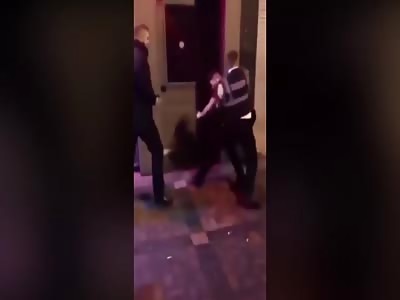 Woman attempts to have a fist fight with a bouncer