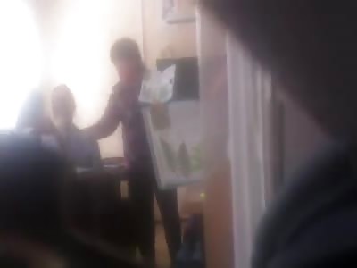Russian teacher beats a schoolgirl